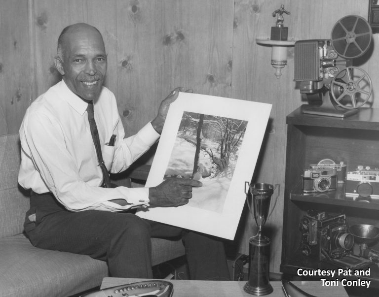 John Banks was one of the few African Americans employed at the Twin Cities Assembly Plant during the mid-twentieth century. During his three decades on the assembly line, he also became well-known as a photographer and organized the Photography Club and the Fishing Club at the plant. In an era when blacks were not readily accepted into most workplaces, he wanted to show his white co-workers that he could do the same things they did. Courtesy Pat and Toni Conley