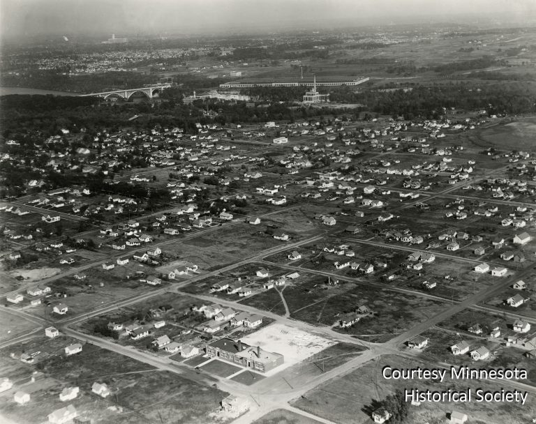 This aerial photo, taken around 1928, shows the different pace at which the two cities were developing along the river. The Minnehaha neighborhood (foreground) showed substantial activity, while the area to the east of the new Ford plant remained largely vacant. Courtesy Minnesota Historical Society
